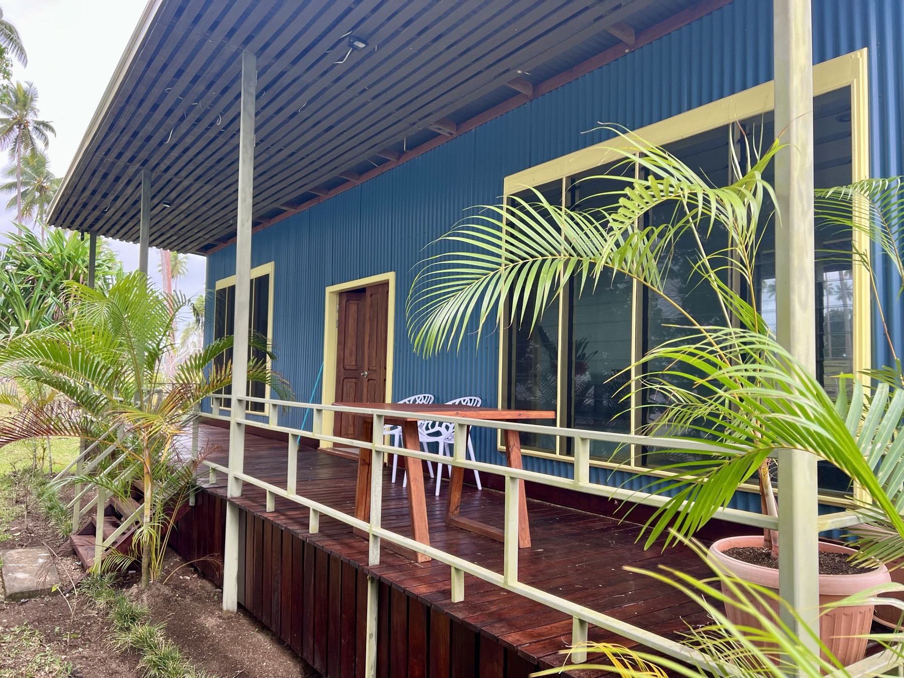 The Lapita Beach House with its veranda, steps from the lagoon on Aore Island