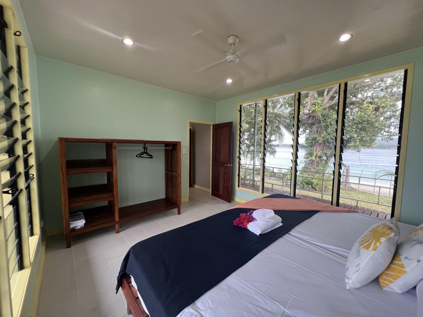 The Lapita Beach House at golden hour, open to the lagoon on Aore Island 3