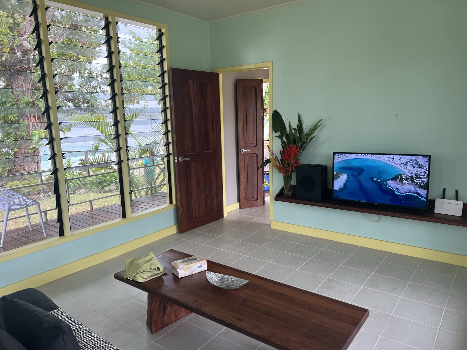 The Lapita Beach House at golden hour, open to the lagoon on Aore Island 5